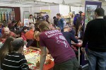 A crowded Pegasus Spiel booth at Essen 2011