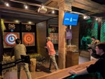 An action shot from our sponsored axe-throwing event